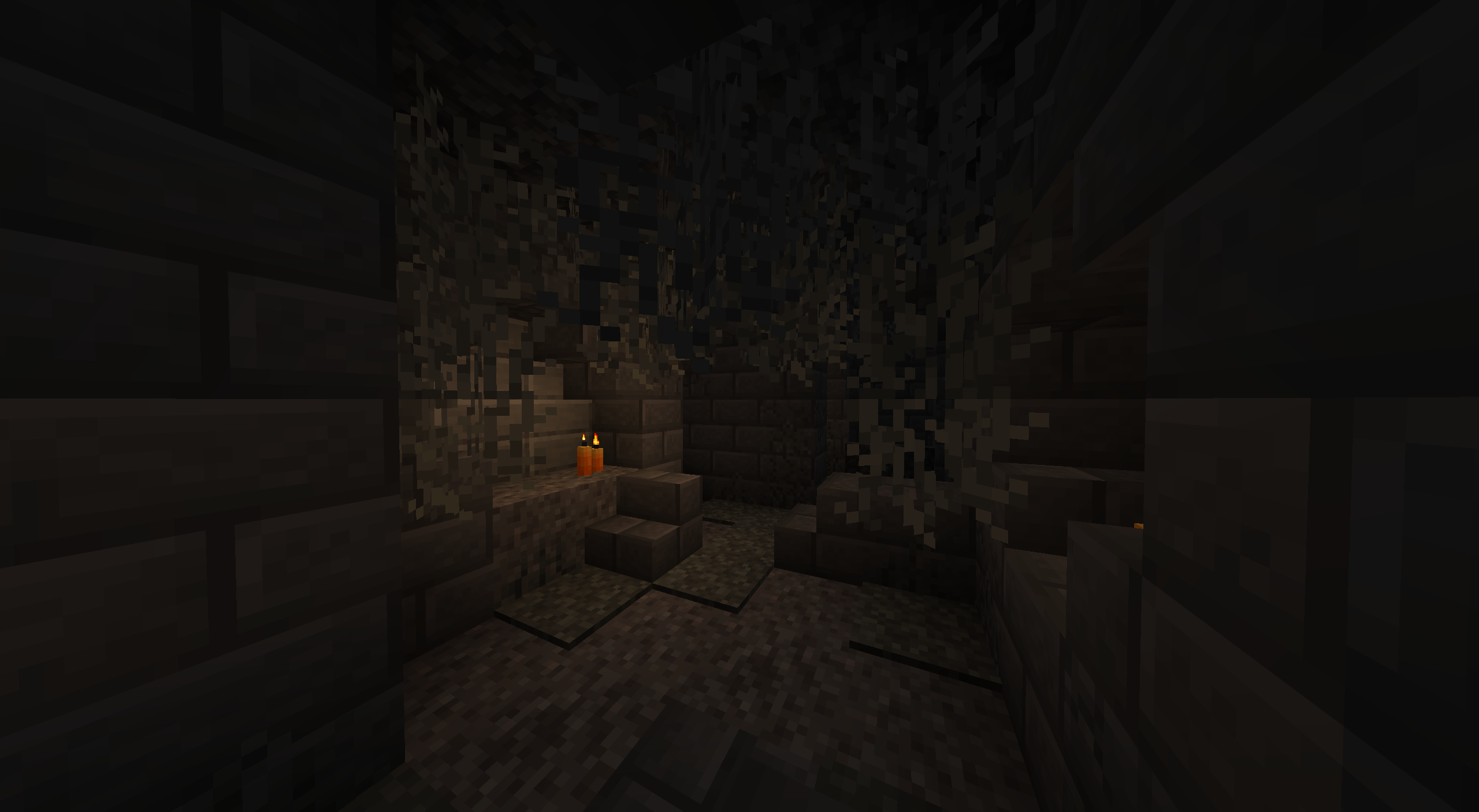 A creaking crypt section displaying suspicious gravel and some orange candles