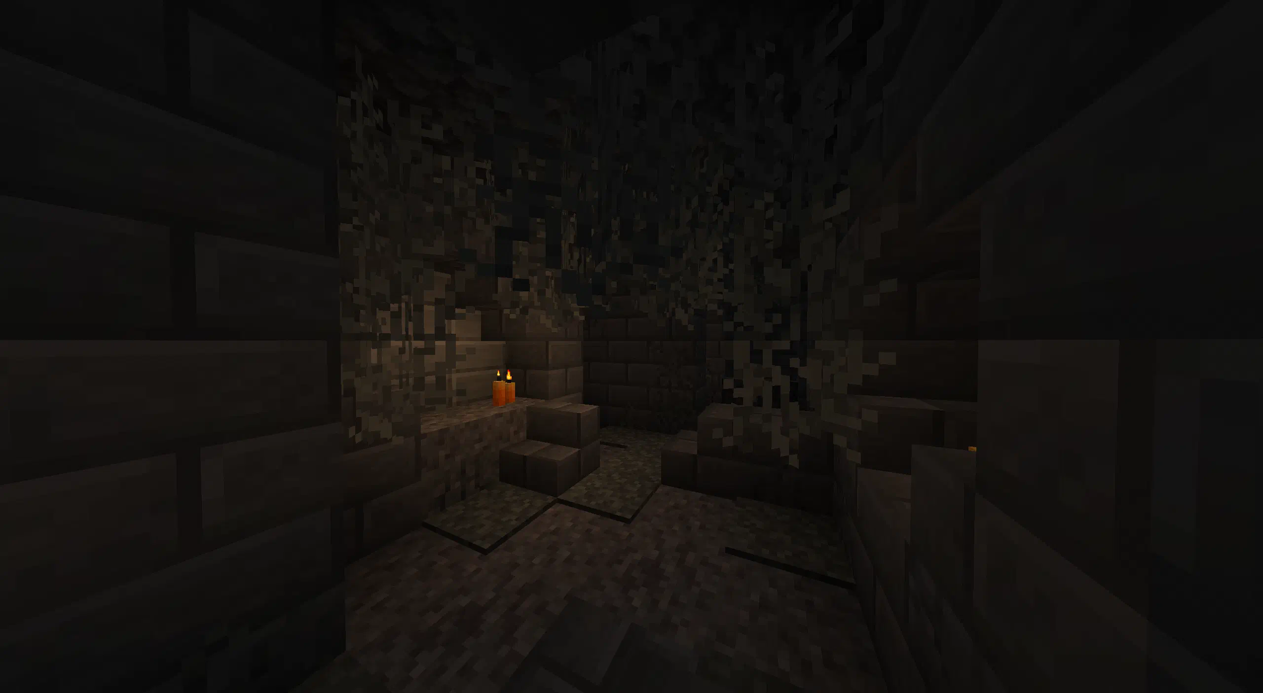 A creaking crypt section displaying suspicious gravel and some orange candles